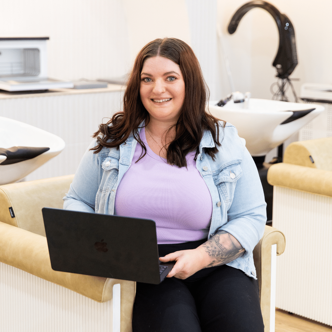 Virtual Beauty Expert working on mac computer in salon